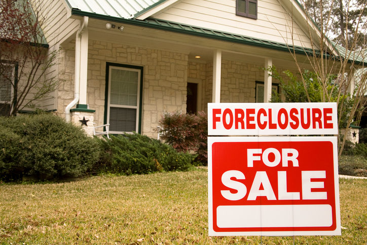 Foreclosure For Sale Sign In Front Of House